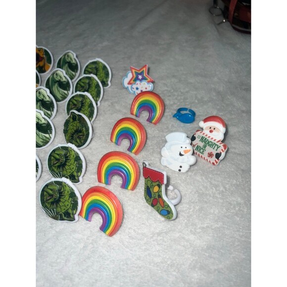Lot of plastic rings - football, dinosaurs, rainbow, Christmas & whale - Picture 3 of 4